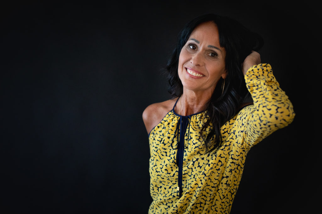 Paziente sorridente in uno studio dentistico